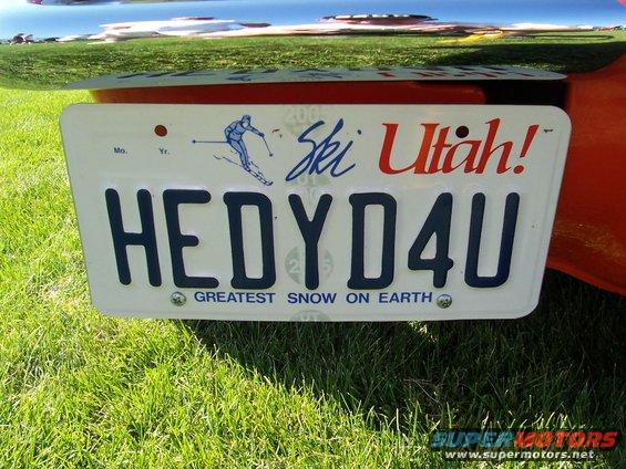License plate reading HEDY D4U with a skier graphic and 'Ski Utah!' text
