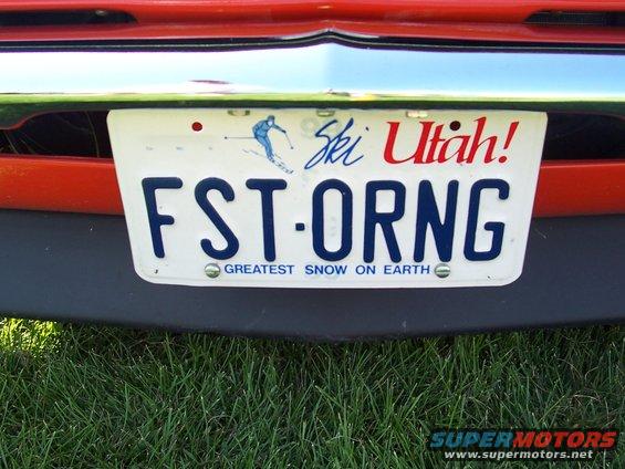 Utah license plate reading FST-ORNG with a skier graphic and 'Greatest Snow on Earth' text