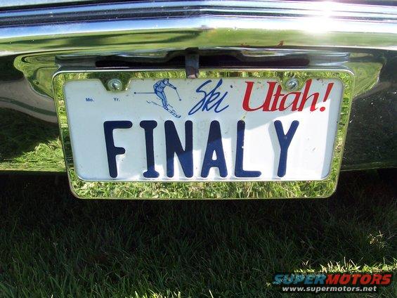 Rear of car with Utah license plate FINALLY and skier graphic