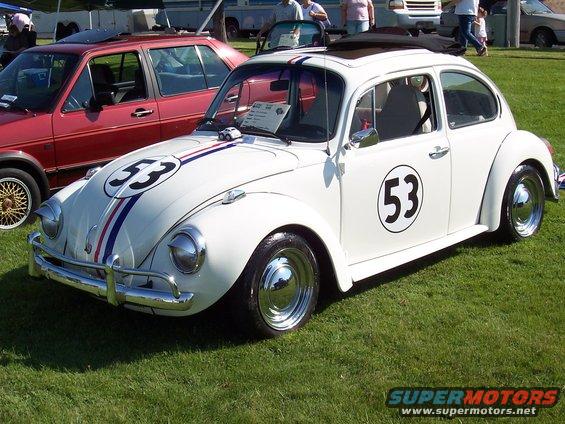 White 1967 Volkswagen Beetle with racing stripes and number 53 on hood and door