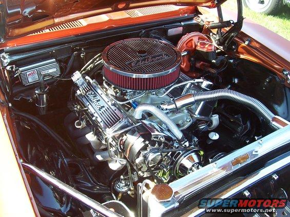 Engine bay with chrome Edelbrock valve covers and air cleaner, MSD ignition box, and chrome radiator cap