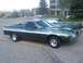1972 Ford Ranchero - Green 1972 Ford Ranchero with silver side trim and aftermarket wheels.
