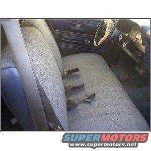 Interior view of a bench seat and dashboard