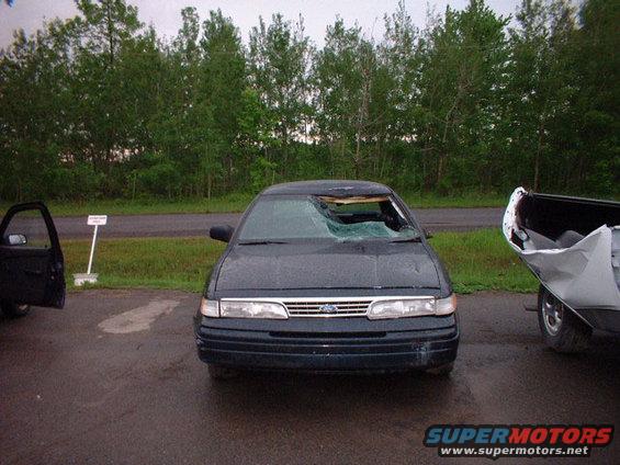 1996 Ford Crown Victoria front view with broken windshield and open driver door