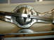 1996 Ford Bronco - Close-up view of a differential housing, a component of a vehicle's drivetrain.
