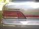 1994 Ford Crown Victoria - Close-up of the rear taillight and trunk badging on a Crown Victoria.