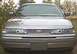 1994 Ford Crown Victoria - Front view of a 1994 Ford Crown Victoria showing its grille and headlights.
