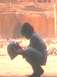 1994 Ford Crown Victoria - Person holding a helmet in a dusty outdoor setting, with a SUPERMOTORS watermark visible.