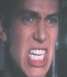 1994 Ford Crown Victoria - A close-up of a man's face with an intense, angry expression and his teeth bared.