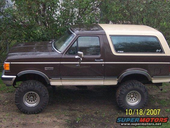 1988 Ford Bronco, brown and tan, lifted with large tires