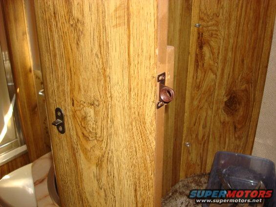 pantry09.jpg this is the old Pantry latch. it broke and just would not hold the door shut. it would slam open and i was afrad it would shater the mirror. 