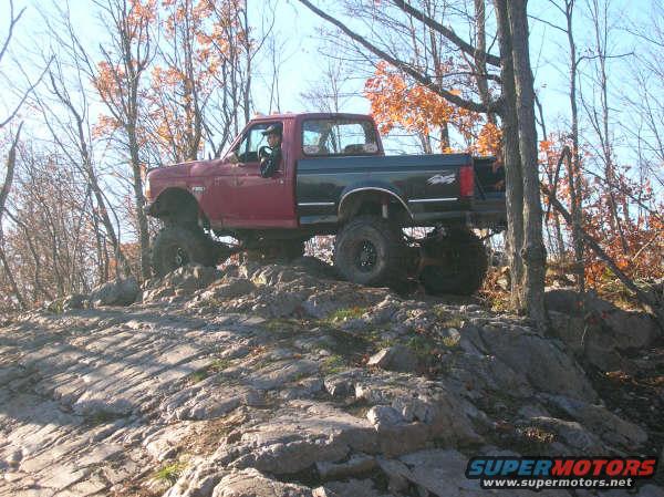1994 Ford F-250 off-roading on rocks