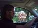 1970 Mercury Cougar - View from inside a car shows three men in white briefs standing in a yard outside.