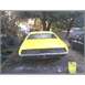 1971 Mercury Cyclone - This yellow car is seen from the rear, with its horizontal taillights visible.