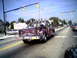 1970 Ford Ranchero - Customized GMC pickup truck with "OFF R DONE" on tailgate, seen from behind on a road.