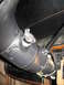 1987 Ford Bronco - Close-up of a vehicle's steering column ignition switch assembly.