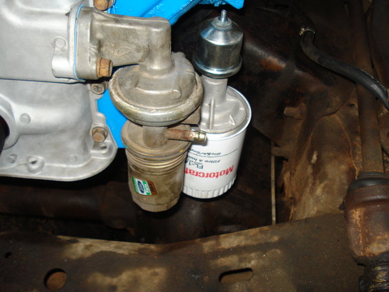 Engine fuel pump and Motorcraft oil filter attached to engine block