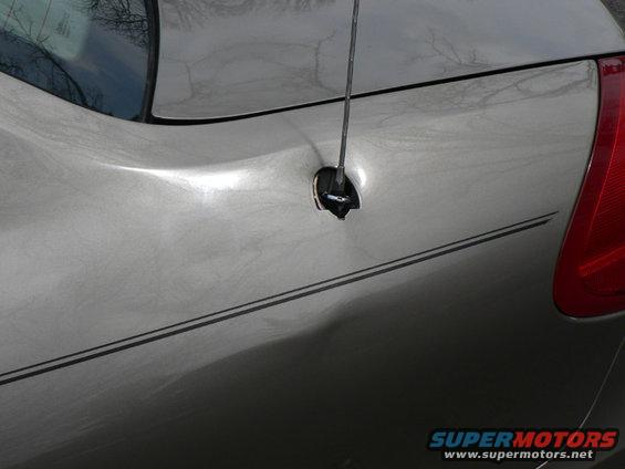 damage3.jpg Driver's rear quater damage