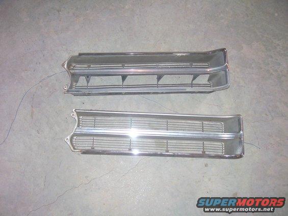 Two chrome car grilles on a concrete floor