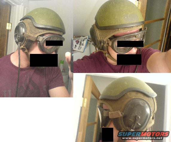 Pilot helmet with goggles and ear protection, worn by a person