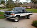 1995 Ford F-150 - This two-tone Ford F-150 pickup truck appears to be from the mid-1990s, matching the registry's claim.
