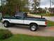 1995 Ford F-150 - Side view of a 1995 Ford F-150 pickup truck with two-tone paint.