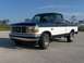 1995 Ford F-150 - This 1995 Ford F-150 pickup truck is shown from the front three-quarter view.