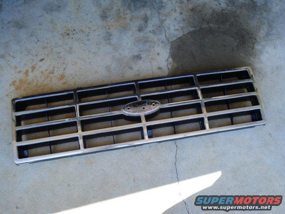 1984 Ford Bronco grille with chrome trim and oval Ford emblem