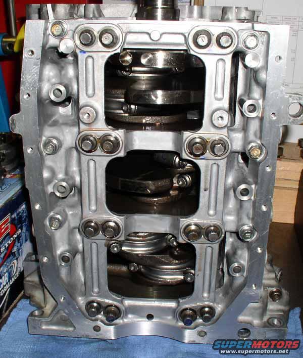 engine block with crankshaft and connecting rods visible inside