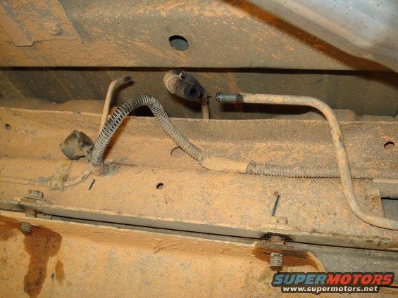Underbody fuel lines and wiring harness with corrugated tubing