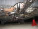 2002 Nissan Maxima - The underside of a vehicle is shown, focusing on the exhaust system and suspension components.