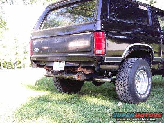 qaedgqag.jpg black ducktape covering the holes untill i get them filled and worked smooth. also note the big rust spot at the bottom.