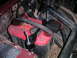 1994 Ford Bronco - Close-up of a vehicle's engine bay, focusing on the battery and surrounding components.