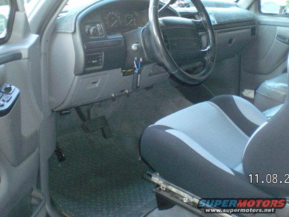 fsb-bronco-pics-024.jpg Put a black & grey cloth racing seat in on the drivers side, I had to buy some 1/4" flat bar and cut to fit while using the stock seat bracket from my existing leather seats to make the J. C. Whitney seat fit. Would have been nice if it came with instructions or a template. If you do this get a seat with a  recliner pull handle not a spinning wheel that takes about two hundred turns to recline the seat four inches....