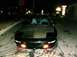 1995 Ford Probe - Front view of a black 1995 Ford Probe GT parked at night.