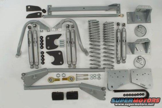 Suspension lift kit parts with shocks, springs, and brackets labeled EDGE