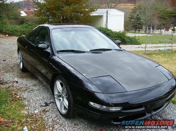 Black 1995 Ford Probe GT coupe, 3/4 front view