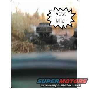 Muddy off-road truck with a speech bubble saying 'yota killer'. Supermotors.net logo at bottom