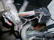 1996 Ford Probe - Close-up view of a vehicle's engine wiring harness, showing various colored wires and electrical connectors.