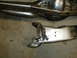 1996 Ford Bronco - Close-up view of automotive suspension components, likely from a vehicle's front or rear axle assembly.