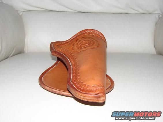 Leather gun holster with floral tooling