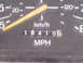 1980 Ford Bronco - Close-up of a vehicle's odometer and speedometer, displaying mileage and speed.