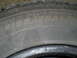 1994 Ford F-250 - Close-up of a tire showing the size P185/70R14 molded into the sidewall.