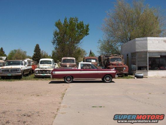 PAinted BU and a bunch of old Ford pickups I ran across driving from Portland OR to Shiloh Il