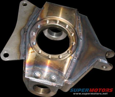 Welded metal suspension component with bolt holes and a central circular opening