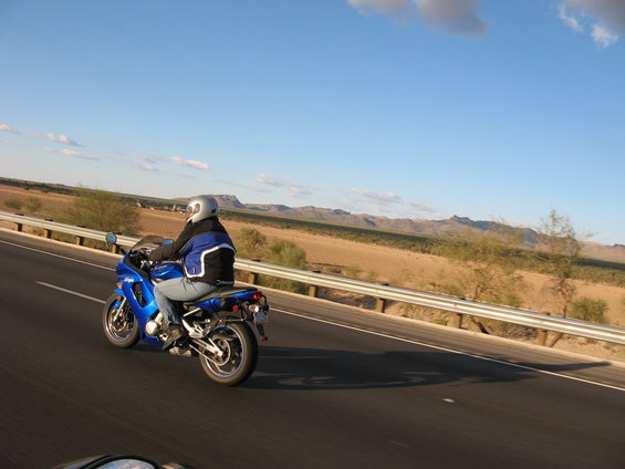 Blue 2007 Kawasaki Ninja motorcycle from the side