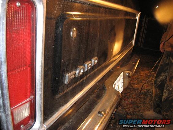 Black Ford Bronco rear quarter panel with Ford badging and chrome bumper