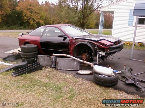 1993 Ford Probe, disassembled, front view, red and black