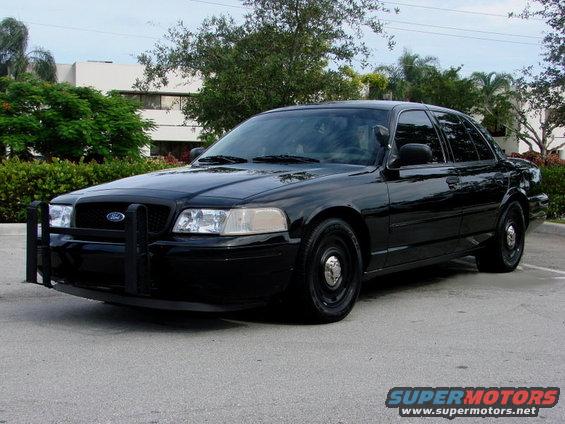 Black 1998 Ford Crown Victoria police car with push bumper