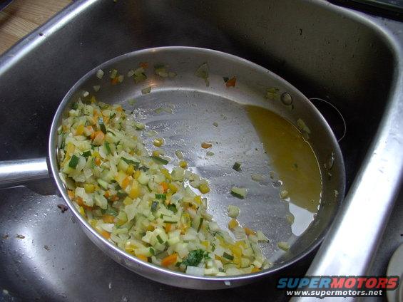 Now I drain the veggies and spoon 'OUT" the last of the juices (and fat) from them.